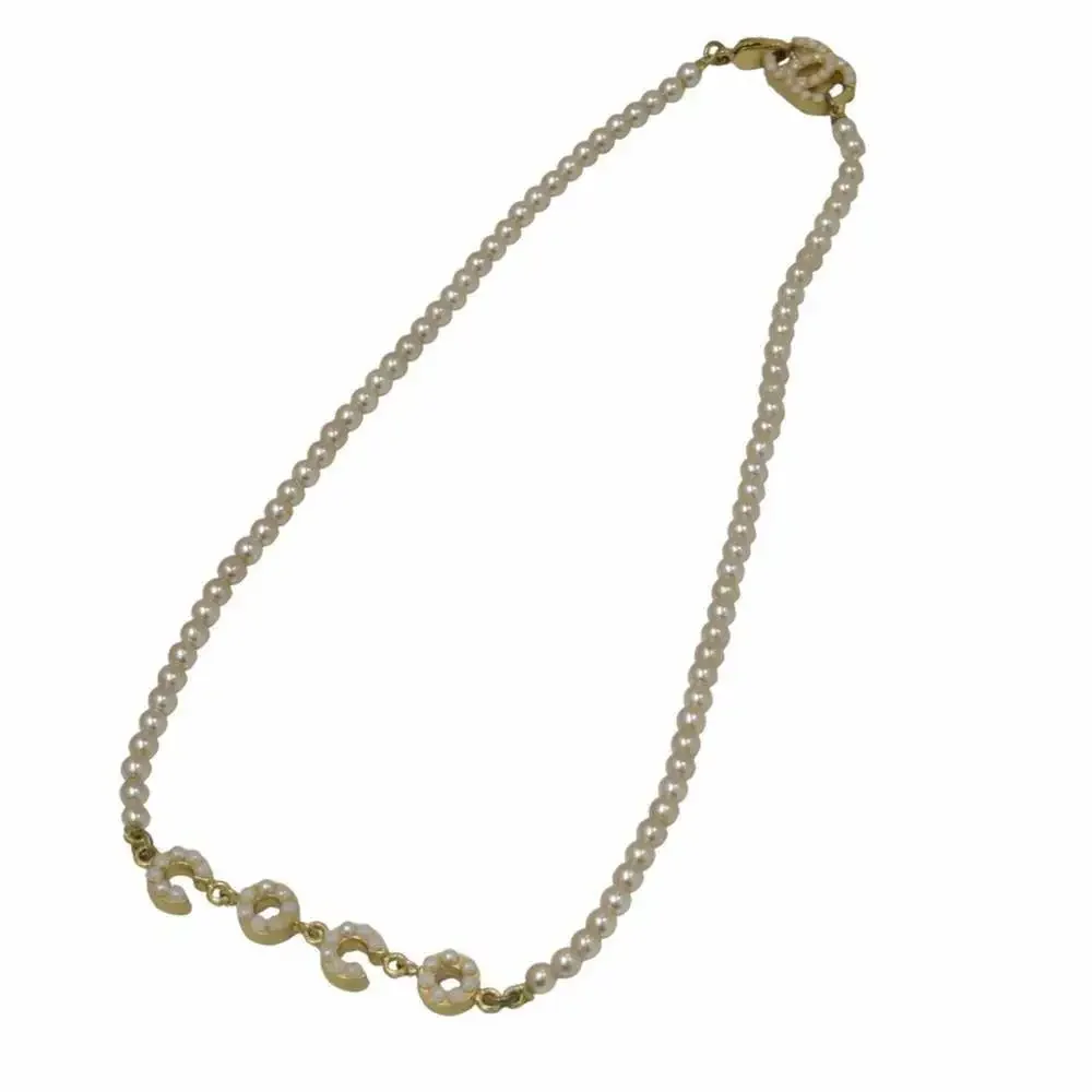 CHANEL Gold Pearl Necklace